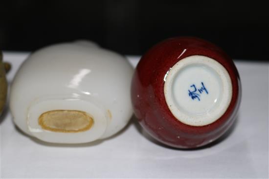Four assorted Chinese snuff bottles largest 9cm